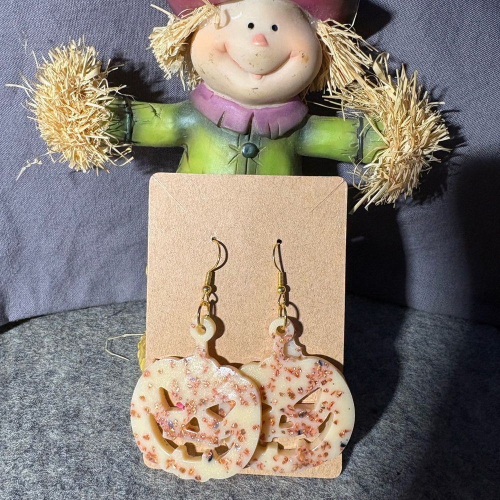 Glow in the dark and orange glitter. Handmade Pumpkin Earrings